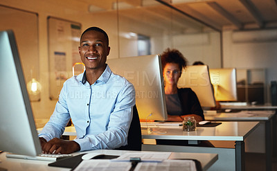 Buy stock photo Portrait, black man and night with desktop, smile and working late in project management. Male person, employee and technology for creative web design with coworking space in digital agency or office