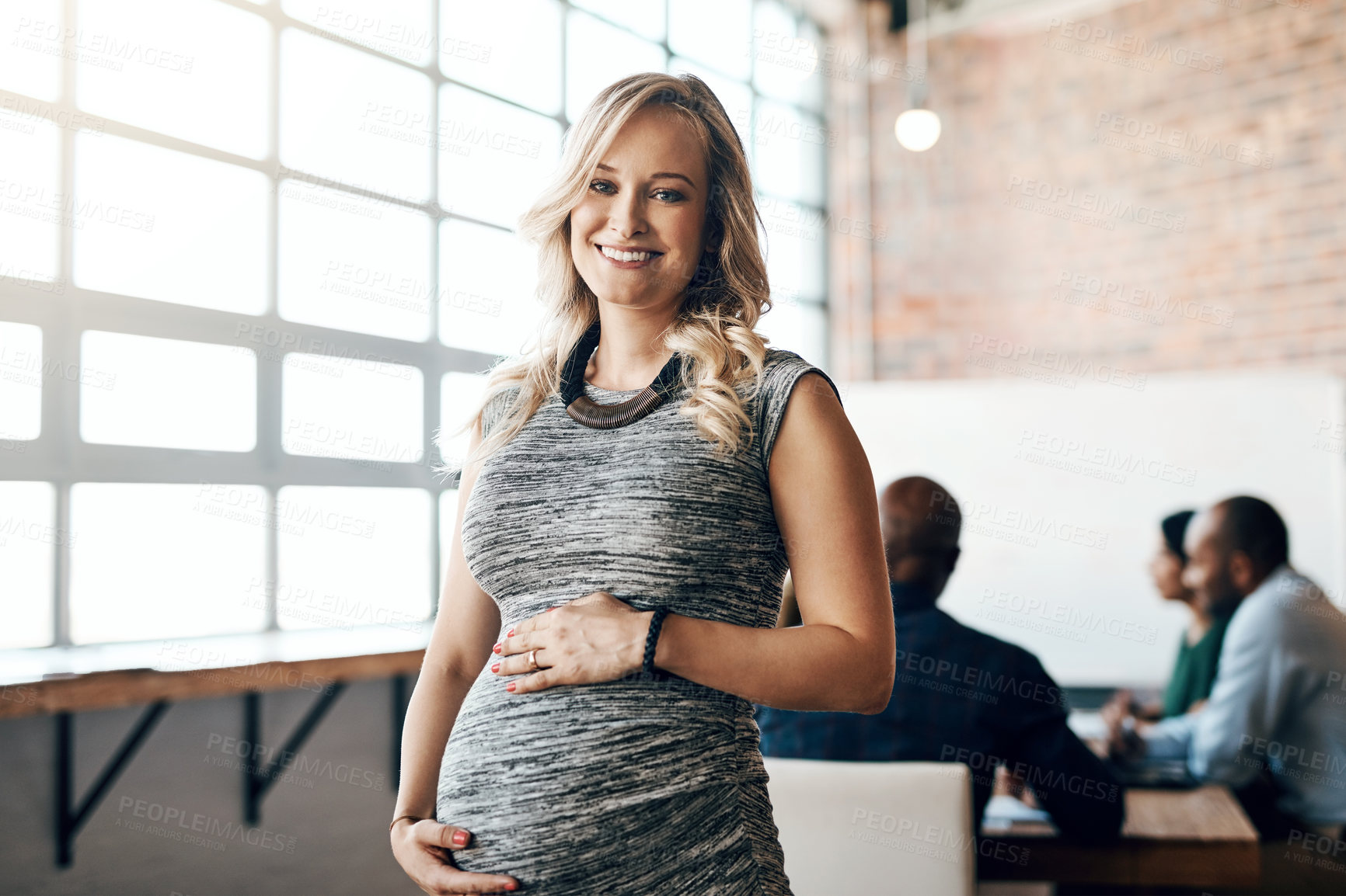 Buy stock photo Portrait of a pregnant businesswoman standing in the boardroom during a presentation