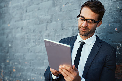 Buy stock photo Tablet, businessman and reading news with confidence or pride as accountant finance agency. Male person, financial consultant and researching for investment opportunity with ideas, tech and gray wall