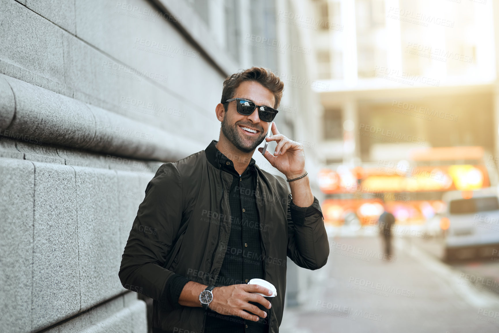 Buy stock photo Man, happy and phone call with sunglasses in city for communication, morning commute and waiting for cab. Person, smile and talking on smartphone with coffee for networking and discussion on sidewalk