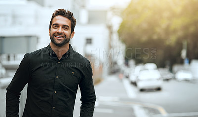 Buy stock photo Cropped shot of a handsome young man traveling through the city