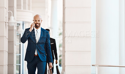 Buy stock photo Cropped shot of a young handsome businessman on a call outside