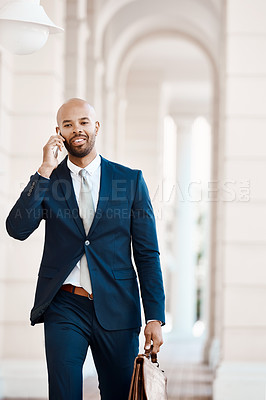 Buy stock photo Cropped shot of a young  handsome businessman on a call outside