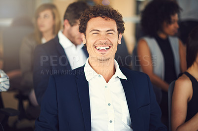 Buy stock photo Cropped shot of a handsome young businessman attending a seminar