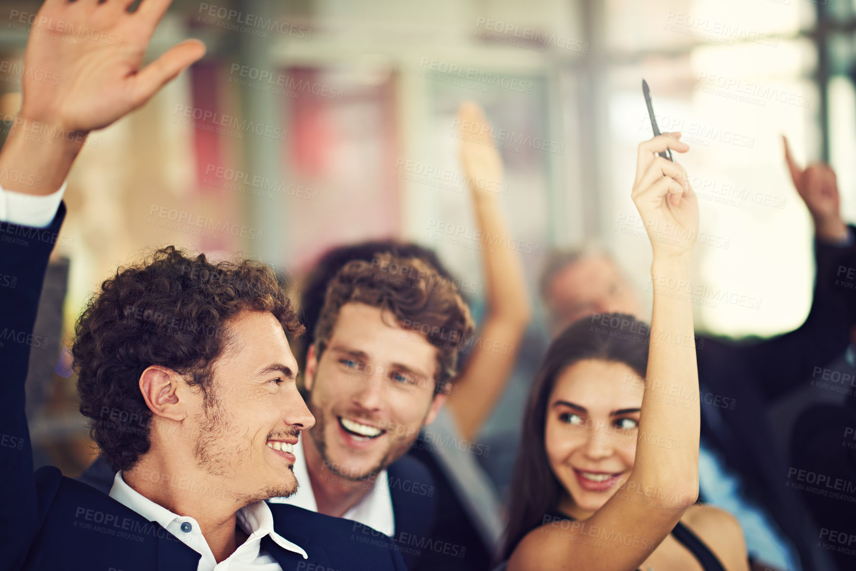 Buy stock photo Cropped shot of businesspeople hands raised asking questions during a seminar