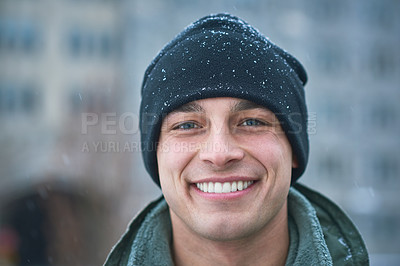 Buy stock photo Shot of a young soldier standing outside on a snowy day at military school
