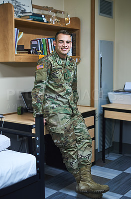 Buy stock photo Shot of a young soldier in the dorms of a military academy