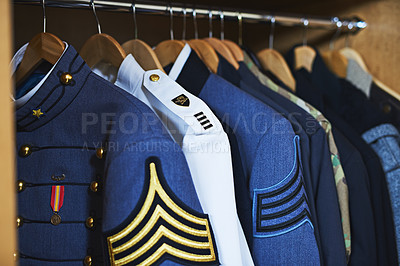 Buy stock photo Jacket, duty and uniform for military, service and clothes hanging in closet, honor and identification. Army, respect and soldier for war, surveillance and protection in battlefield and authority