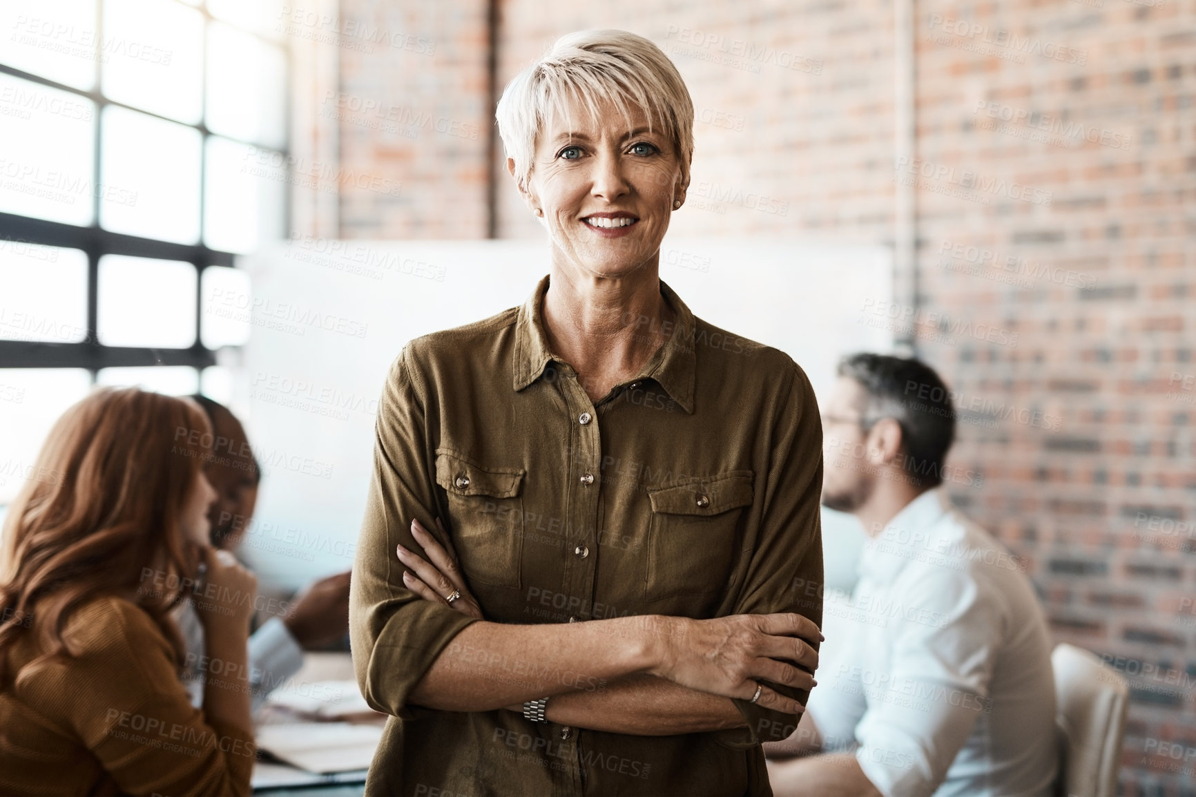 Buy stock photo Portrait, senior and business woman with arms crossed in office meeting. Face, confidence and happy female entrepreneur, professional and person with pride for career, job and leadership at workplace