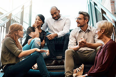 Buy stock photo Office, discussion and creative team on stairs for talking, hangout and break to relax. Business people, men and women as journalist with conversation, opinion and listening in workplace steps