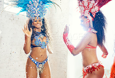 Buy stock photo Women, samba or Brazilian carnival dancers in celebration event, street party or city performance in Rio de Janeiro. Happy, dancing festival or festive costume and feather accessory or salsa fashion