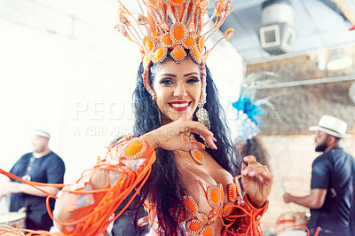 Buy stock photo Carnival, samba and Brazil dancer doing performance in orange feather costumer for festival, celebration and party event. Portrait of latin woman dancing lambada at Rio de janeiro street parade fun 