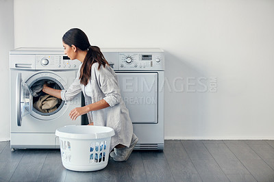 Buy stock photo Woman, laundry or textile in washing machine in home for housekeeping, dirty linen or hygiene with basket. Spring cleaning, clothes or loading fabric in electrical appliance for housework in washroom