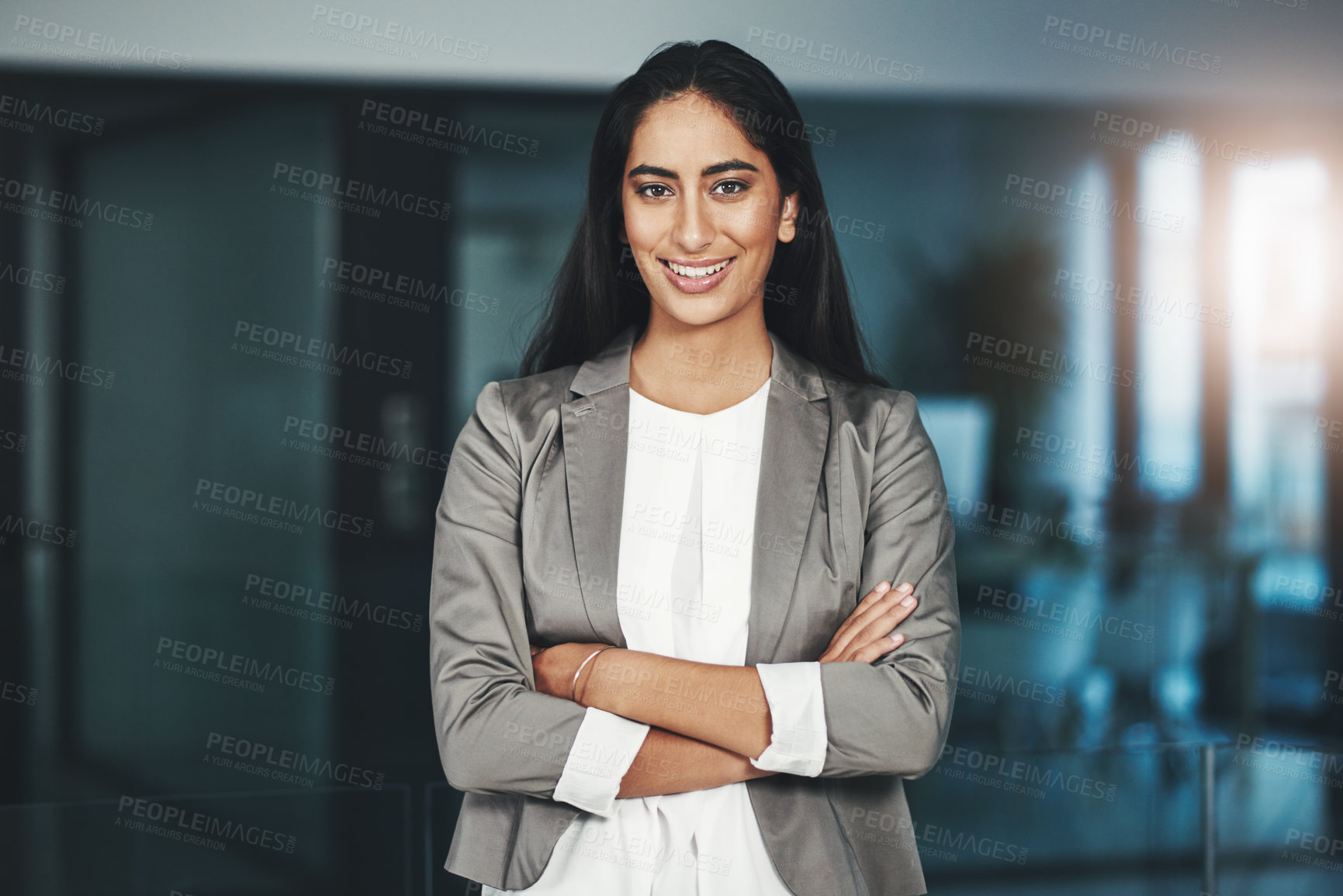 Buy stock photo Portrait of a young businesswoman standing in an office