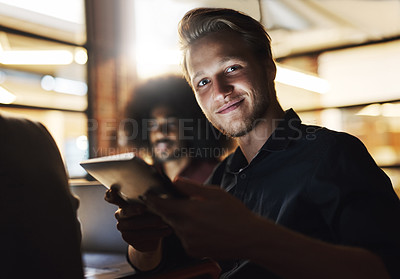 Buy stock photo Cropped portrait of a handsome young male designer sitting in the boardroom during a meeting