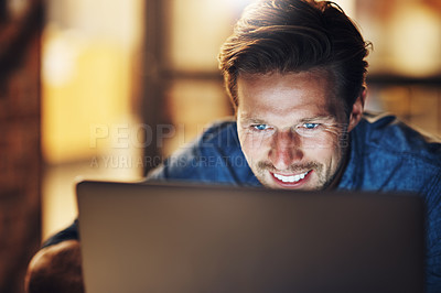 Buy stock photo Man, laptop and smile in office at night for business research, project and reading email or news. Trader, tech and trading with remote work for investment progress, stock market or profit growth