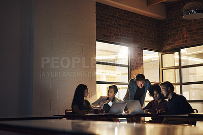 Buy stock photo Cropped shot of a group of designers having a brainstorming session in the boardroom