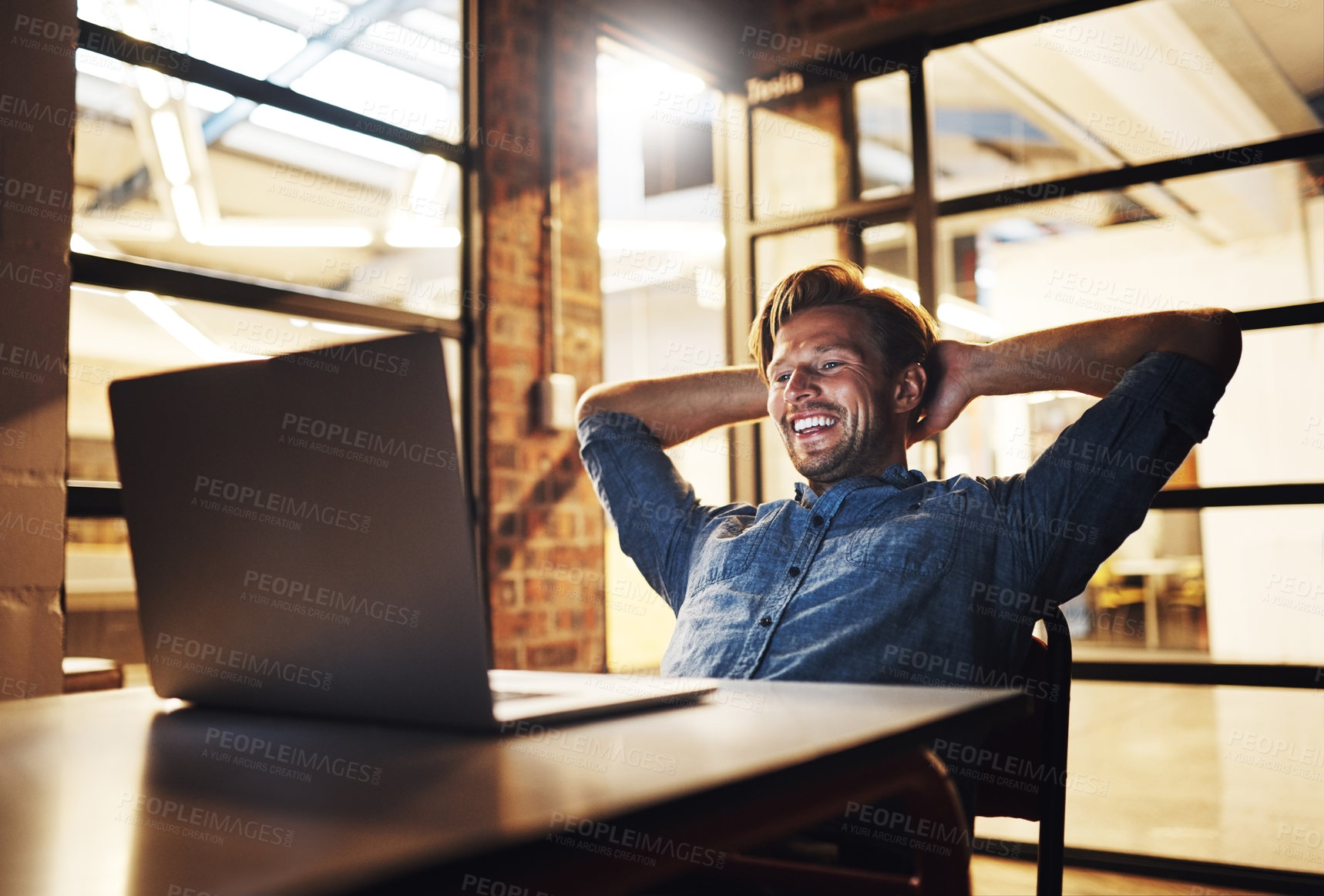 Buy stock photo Office, man and laid back on laptop at night with smile for email, good news and loan or funding approval for small business. Male person, entrepreneur and happy with target, task and deadline 