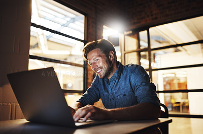 Buy stock photo Office, man and smile on laptop at night for email with good news on loan or funding approval for small business. Male person, entrepreneur and happy with reaching target or task and deadline