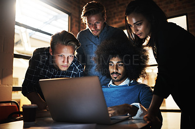 Buy stock photo Cropped shot of a group of young designers having a brainstorming session in the boardroom