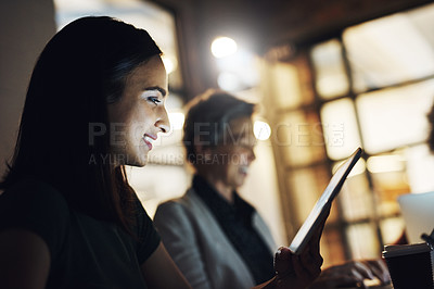 Buy stock photo Cropped shot of an attractive young female designer sitting in the boardroom during a meeting