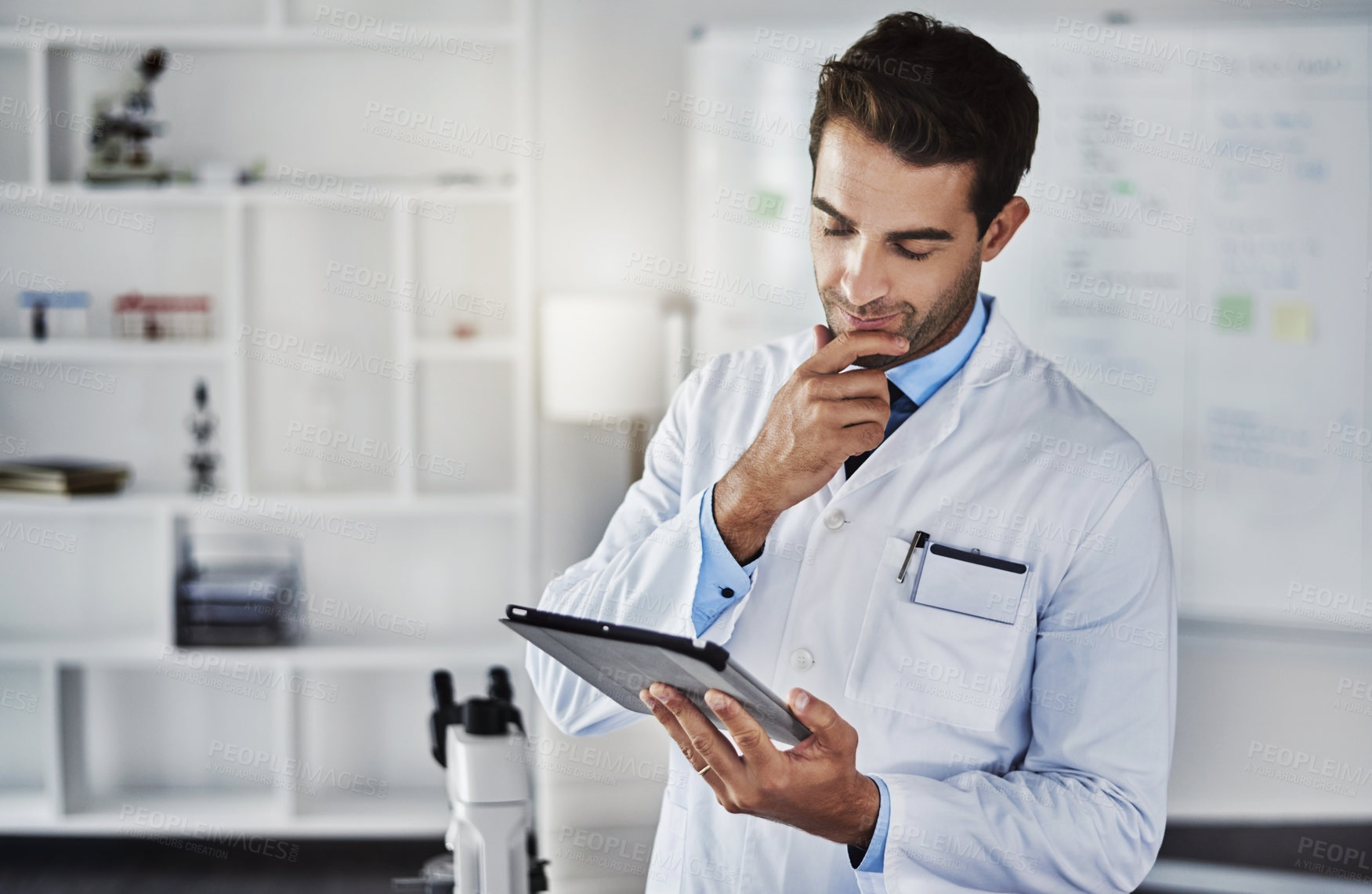 Buy stock photo Thinking, scientist and man with tablet in lab for research, data analytics and reading experiment test results. Male doctor, digital and online report, information and manufacturing vaccine solution