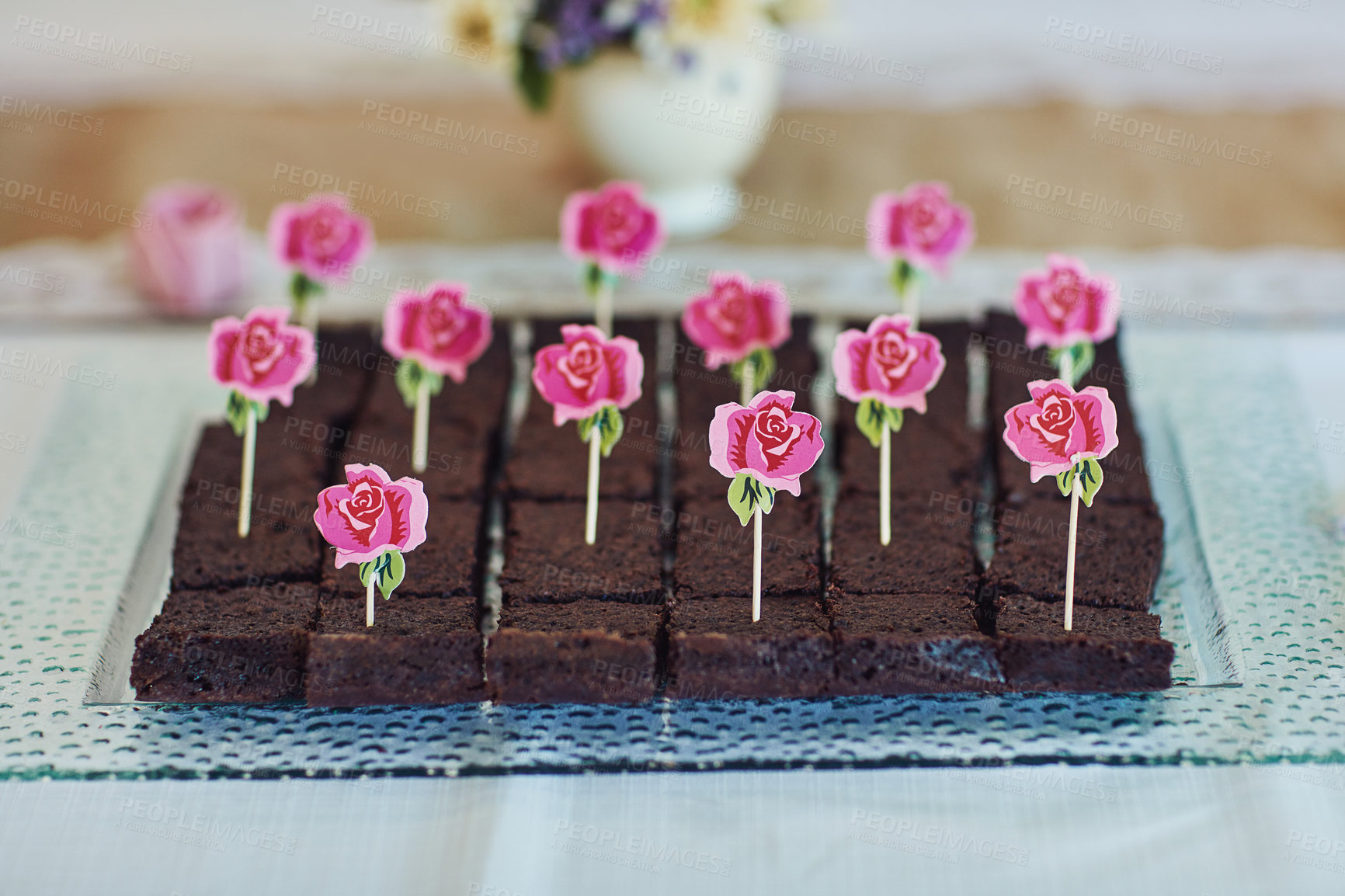 Buy stock photo Shot of chocolate brownies on a table at a tea party inside