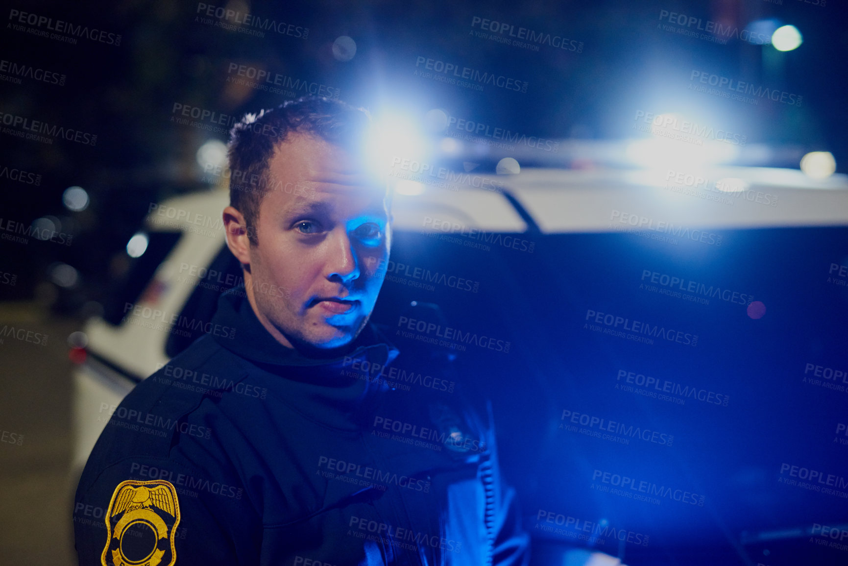 Buy stock photo Cropped portrait of a handsome young policeman out on patrol