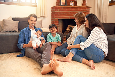 Buy stock photo Full length portrait of an affectionate young family spending quality time together at home