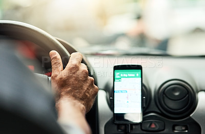 Buy stock photo Closeup shot of a man using a phone to find directions while driving