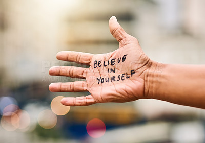 Buy stock photo Cropped shot of a woman showing a motivational message written on her hand