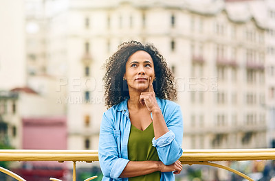 Buy stock photo Shot of an attractive young woman out and about in the city