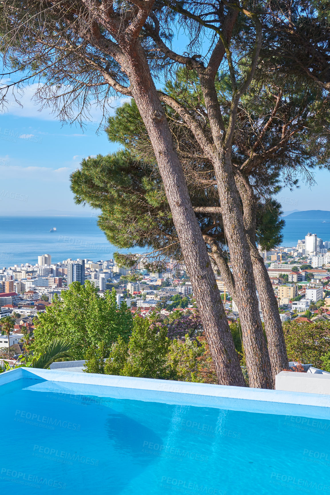 Buy stock photo City, swimming pool and trees with view from hotel for luxury holiday, travel or vacation in summer. Horizon, sea and sky with scenic location of urban town from building rooftop for hospitality