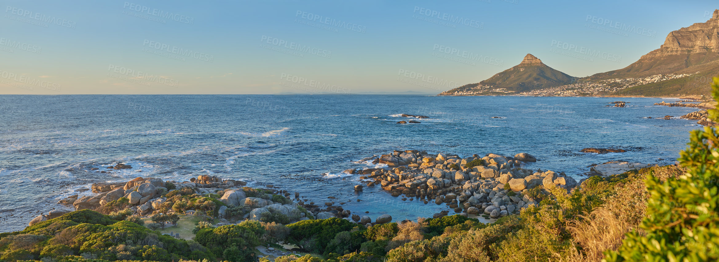 Buy stock photo Beautiful landscape view of Lions Head, Table Mountain National Park, Cape Town, South Africa. Panorama of seascape with mountains and lush green nature. Scenic view of the sea or ocean in summer