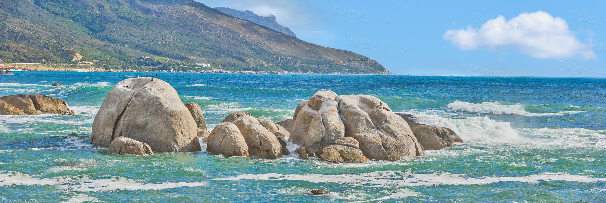 Buy stock photo Ocean seascape of  Camps Bay beach, Table Mountain National Park, Cape Town, South Africa. Calm scenic sea landscape with rocks and waves on a blue horizon. Stunning turquoise water by a coastline 