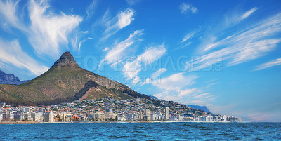 Buy stock photo Copy space, panorama seascape with clouds, blue sky,  hotels, and apartment buildings in Sea Point, Cape Town, South Africa. Lion's head mountain overlooking the beautiful blue ocean peninsula 