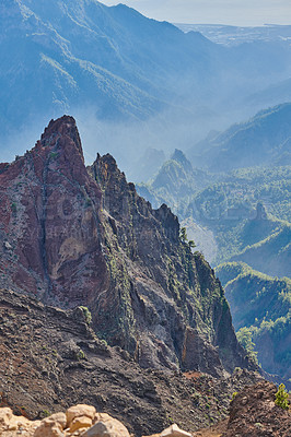 Buy stock photo Rocky landscape of mountains and hills in the remote area of La Palma, Canary Islands, Spain. Scenic view of mother nature, dirt and flora. The calm and beauty of nature