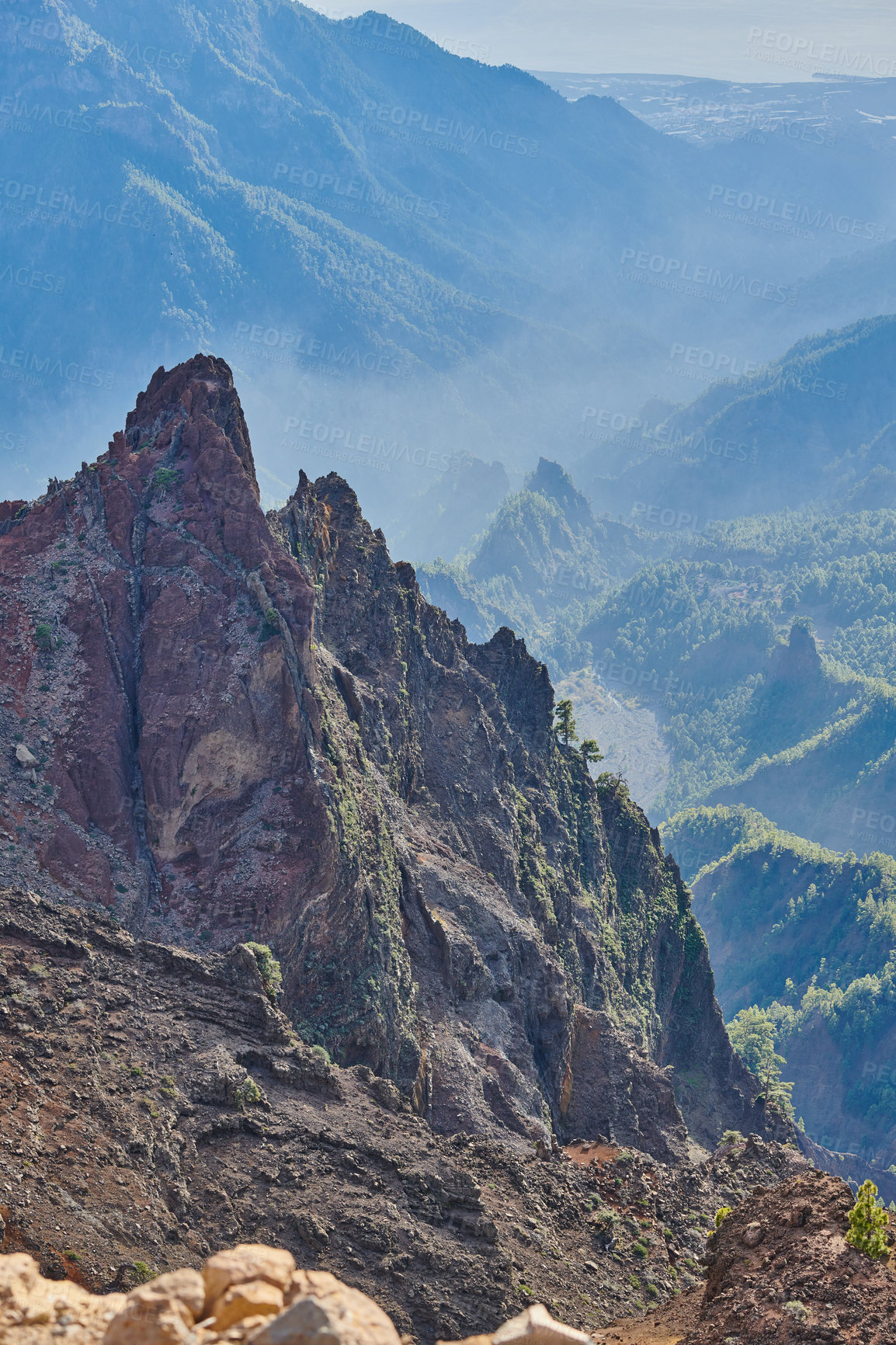 Buy stock photo Rocky landscape of mountains and hills in the remote area of La Palma, Canary Islands, Spain. Scenic view of mother nature, dirt and flora. The calm and beauty of nature