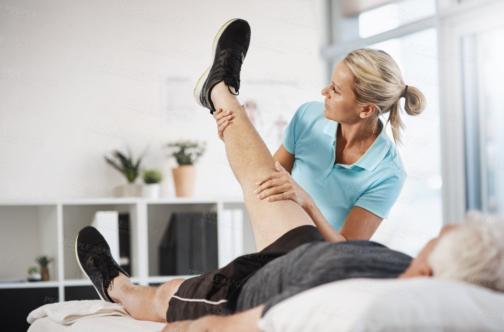 Buy stock photo Physical therapy, woman and stretching knee for medical consultation, exam and assessment of injury or muscle. Orthopedic, patient or doctor with leg recovery, progress and massage in physiotherapy