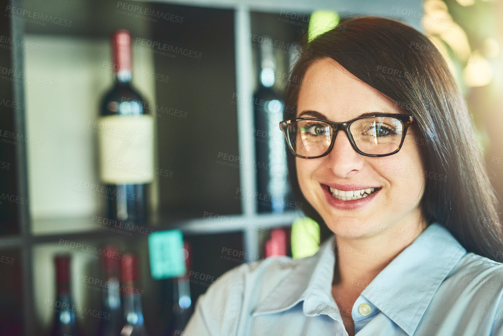 Buy stock photo Happy, glasses and portrait of woman in restaurant with wine cellar for alcohol beverage. Smile, industry and female waitress with positive attitude for hospitality career in cafe with champagne.