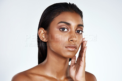Buy stock photo Studio, beauty and portrait of Indian woman with skincare from dermatology in mockup space. Face, makeup and girl with confidence from healthy facial or pride from cosmetics in white background