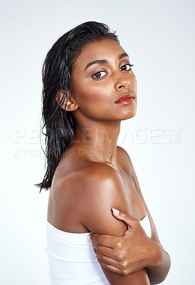 Buy stock photo Portrait, skincare and beauty of Indian woman in studio for body wellness isolated on a white background in spa. Face, cosmetics and serious model in makeup for dermatology, shine or glow for health