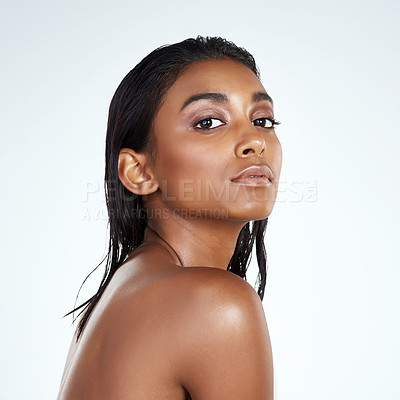 Buy stock photo Studio, portrait and Indian woman with natural beauty from dermatology in mockup space. Face, skincare and girl with confidence from glow on skin or pride from healthy cosmetics in white background