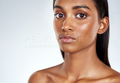 Buy stock photo Skincare, beauty and studio portrait of Indian woman for dermatology in mockup space. Face, makeup and calm girl with confidence from healthy glow on skin or pride from cosmetics in white background