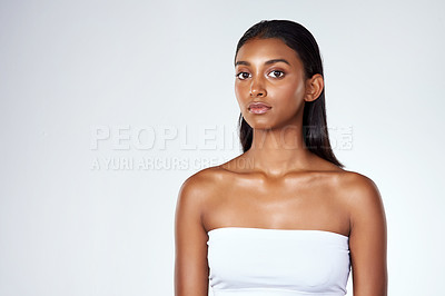 Buy stock photo Portrait, skincare and beauty of Indian woman in studio for wellness isolated on a white background mockup space. Face, cosmetics and serious model in makeup for dermatology, shine or body for health