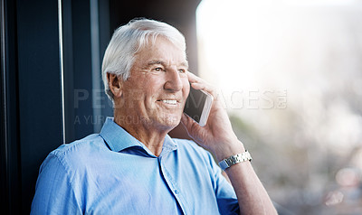 Buy stock photo Cropped shot of a senior businessman on a call outside the office