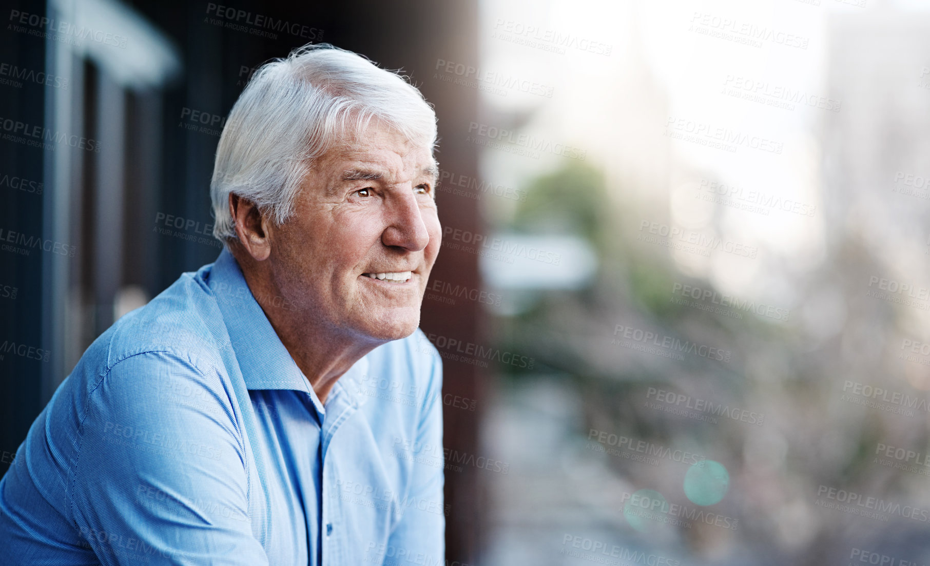Buy stock photo Cropped shot of a senior businessman outside the office looking at the city