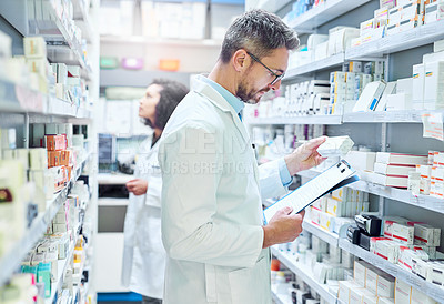 Buy stock photo Healthcare, inventory and man with clipboard in pharmacy for stock, information and prescription. Dispensary, professional and mature pharmacist with documents for medicine, checklist and inspection