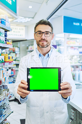 Buy stock photo Man, pharmacy and tablet with green screen with healthcare, shop or mockup for pharmaceutical promo on app. Mature pharma expert, digital touchscreen and space with chromakey for mock up in store
