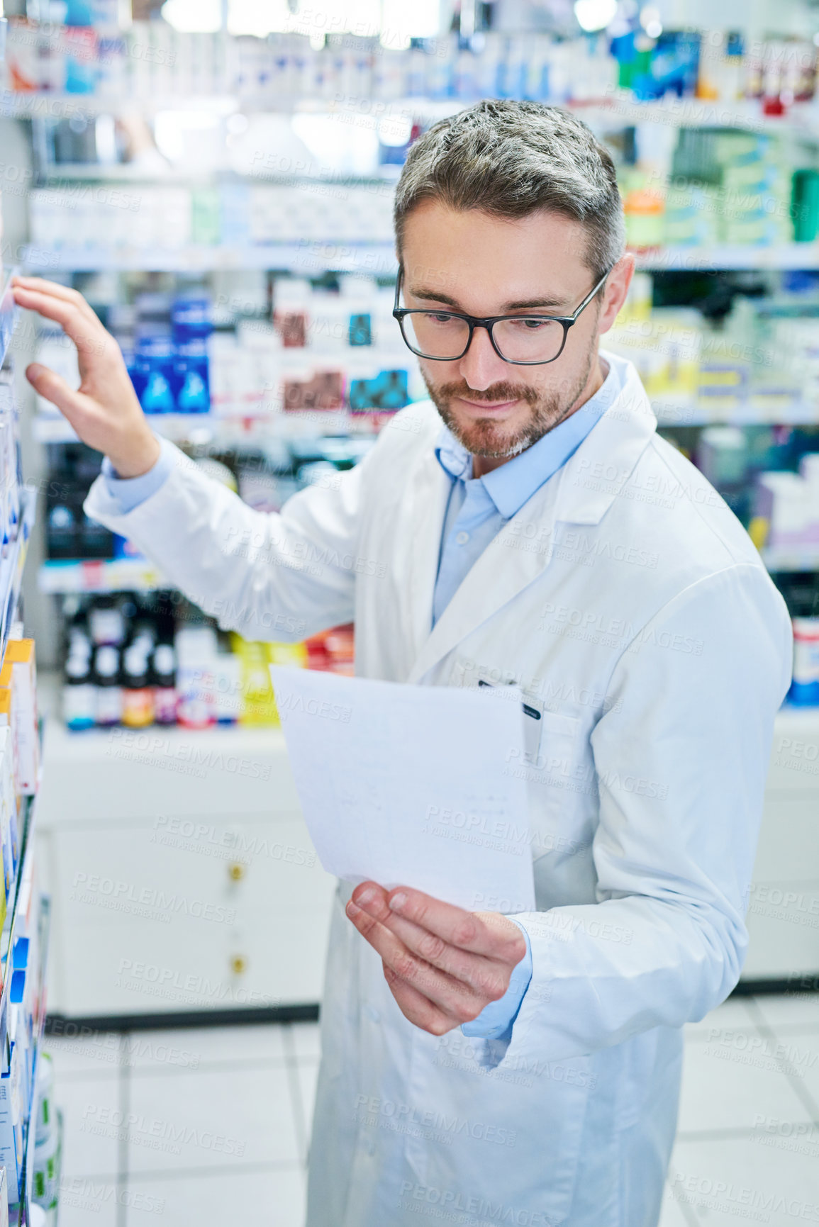 Buy stock photo Pharmacy, medical and prescription with man and shelf for pills, advice and medicine inspection. Healthcare, insurance and antibiotic search with pharmacist for inventory, drugstore and dispensary